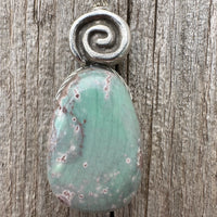 Variscite for Encouragement, Abundance, and Love. Swirl to Signify Consciousness.