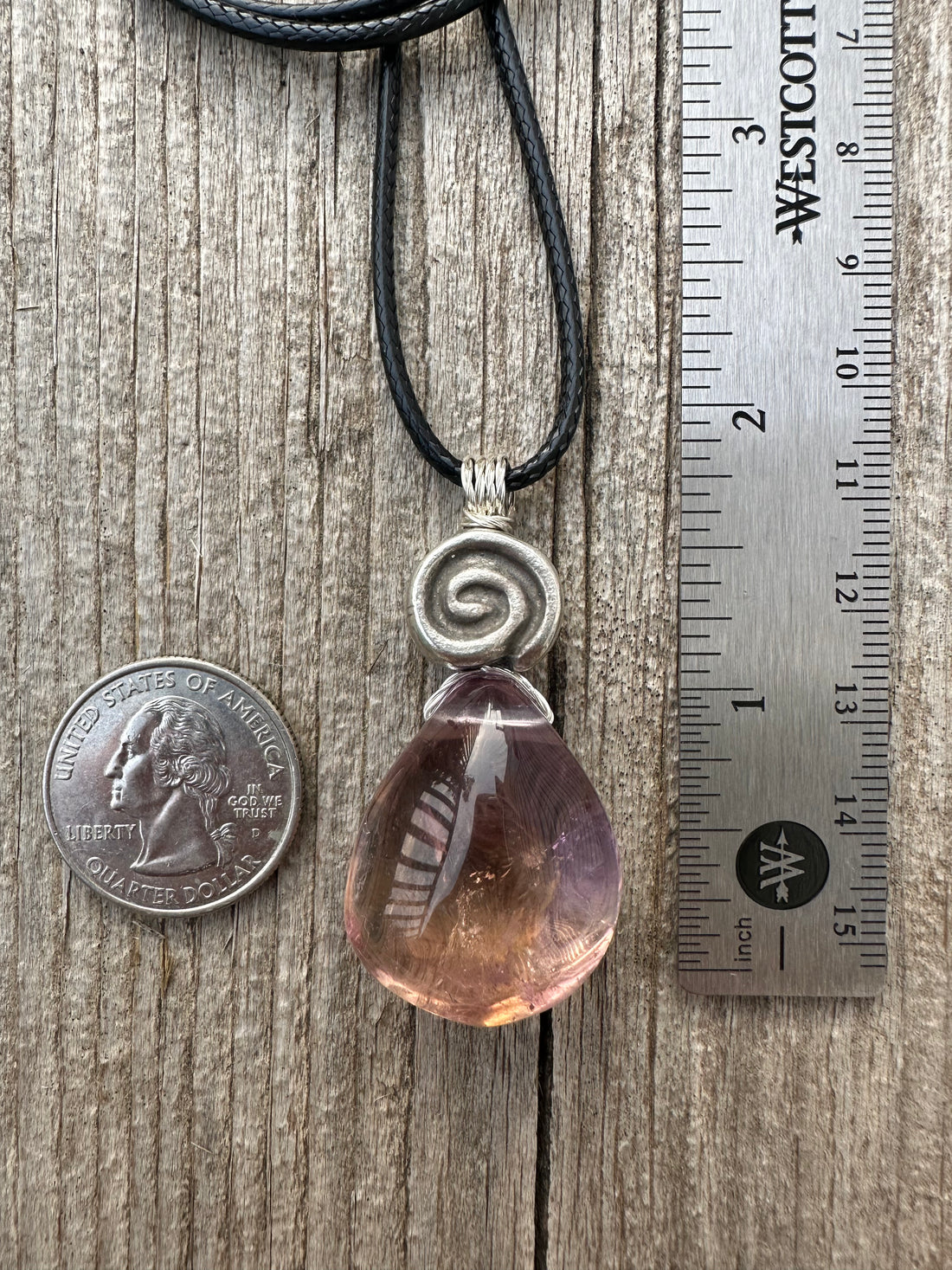 Ametrine for Connecting Physical and Metaphysical Realms, Clarity, and Harmony. Swirl to Signify Consciousness.