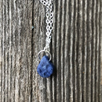 Sodalite for Creativity and Inspiration. Swirl to Signify Consciousness.