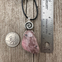 Rhodonite for Compassion, Balancing Emotions, and Self Confidence. Swirl to Signify Consciousness.