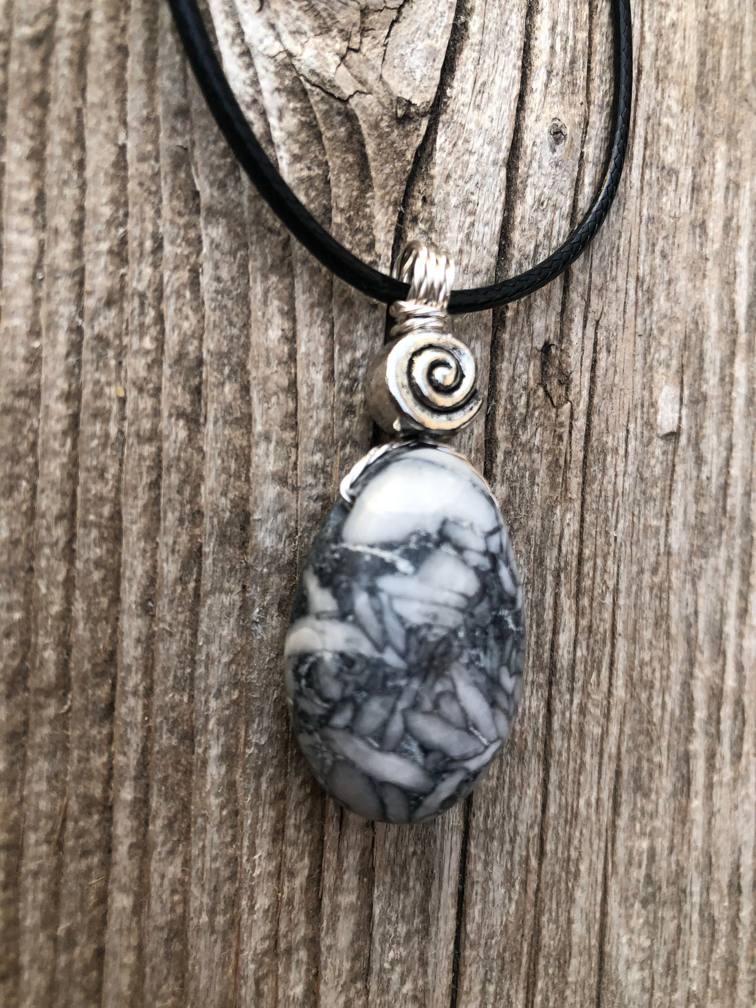 Pinolith for a Deeper Connection to Self, Spiritual Awakening, and Grounding. Swirl to Signify Consciousness.