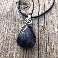 Iolite to Awaken Psychic Abilities. Used in Shamanic Practices. Swirl to Symbolize Consciousness.