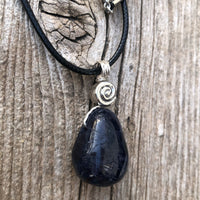 Iolite to Awaken Psychic Abilities. Used in Shamanic Practices. Swirl to Symbolize Consciousness.