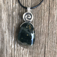 Ocean Jasper for Positivity, Forward Movement. Swirl to Signify Consciousness.