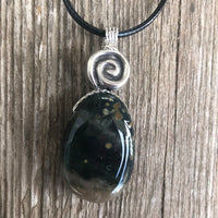 Ocean Jasper for Positivity, Forward Movement. Swirl to Signify Consciousness.