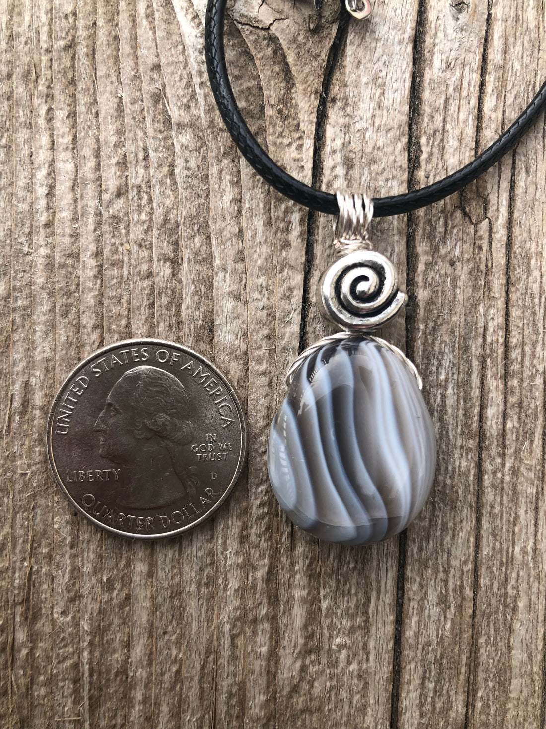 Botswana Agate for Energizing the Auric Field and Bringing Solutions. Swirl to Signify Consciousness.