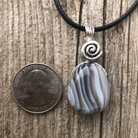 Botswana Agate for Energizing the Auric Field and Bringing Solutions. Swirl to Signify Consciousness.