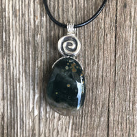 Ocean Jasper for Positivity, Forward Movement. Swirl to Signify Consciousness.