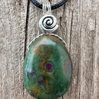 Ruby in Fuchsite for Positivity, Psychic Awareness and Abundance. Swirl to Signify Consciousness.