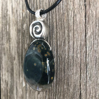 Ocean Jasper for Positivity, Forward Movement. Swirl to Signify Consciousness.