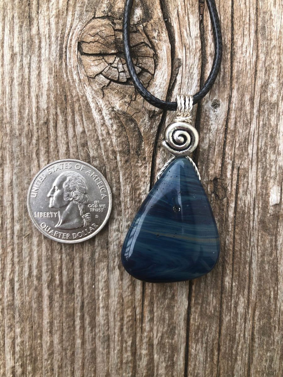 Sieber Agate for Strength, Confidence and Protection. Swirl to Signify Consciousness.