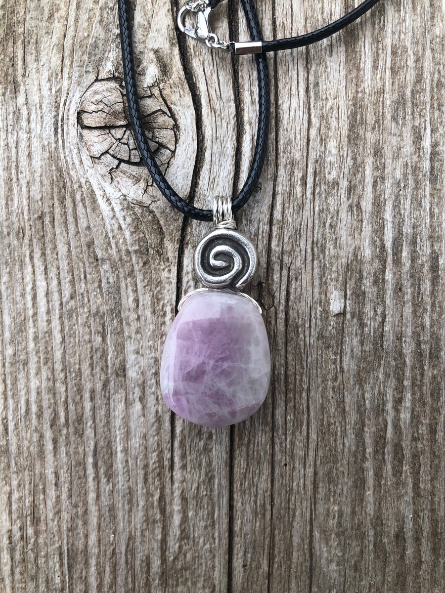 Kunzite for Protection, Intuition and Heart Awareness. Swirl to Signify Consciousness.