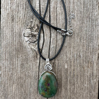 Ruby in Fuchsite for Positivity, Psychic Awareness and Abundance. Swirl to Signify Consciousness.