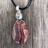 Rhodochrosite for Positivity and Love. Accent Piece is Pewter.