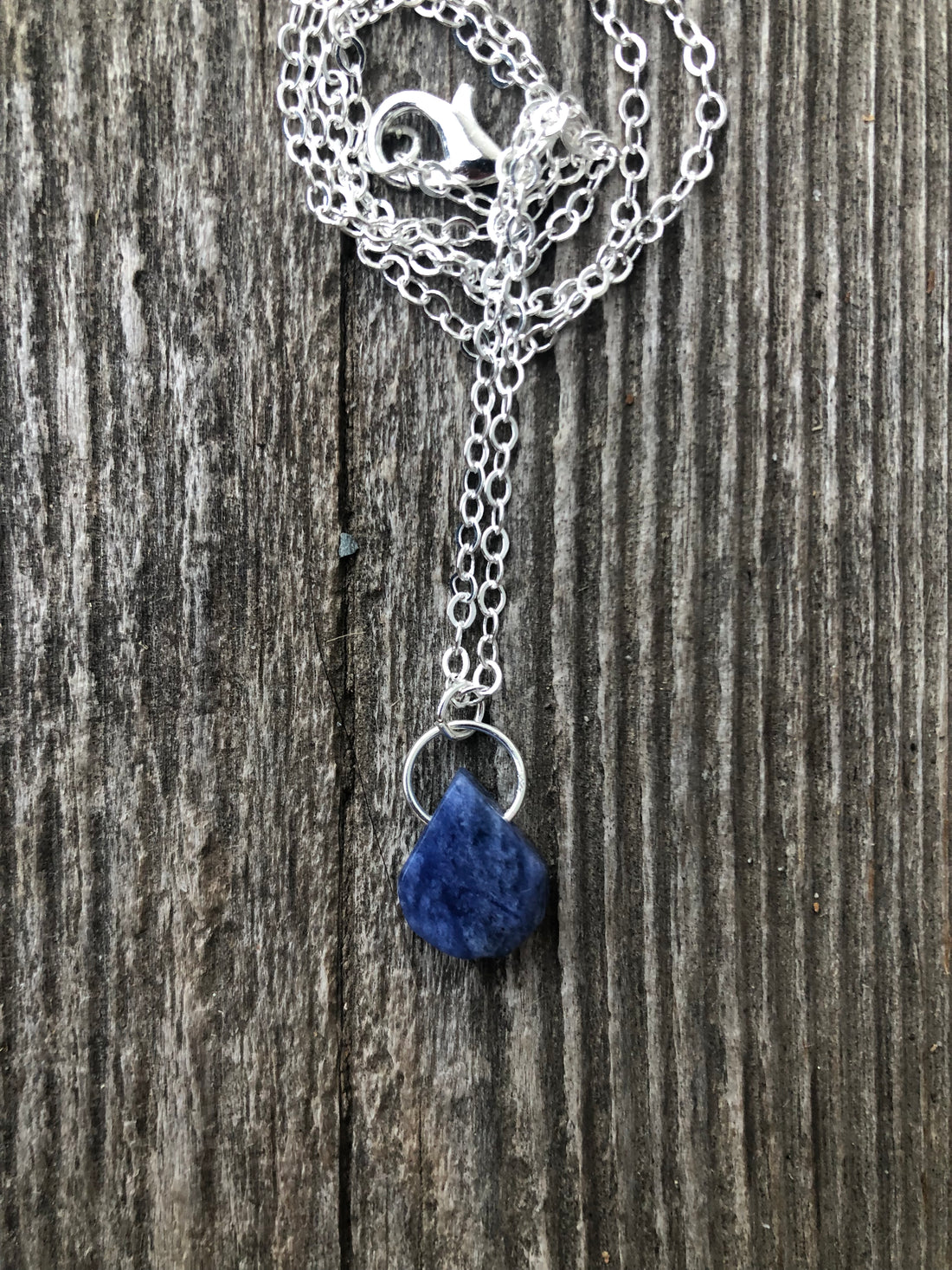 Sodalite for Creativity and Inspiration. Swirl to Signify Consciousness.