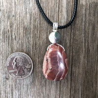 Rhodochrosite for Positivity and Love. Accent Piece is Pewter.