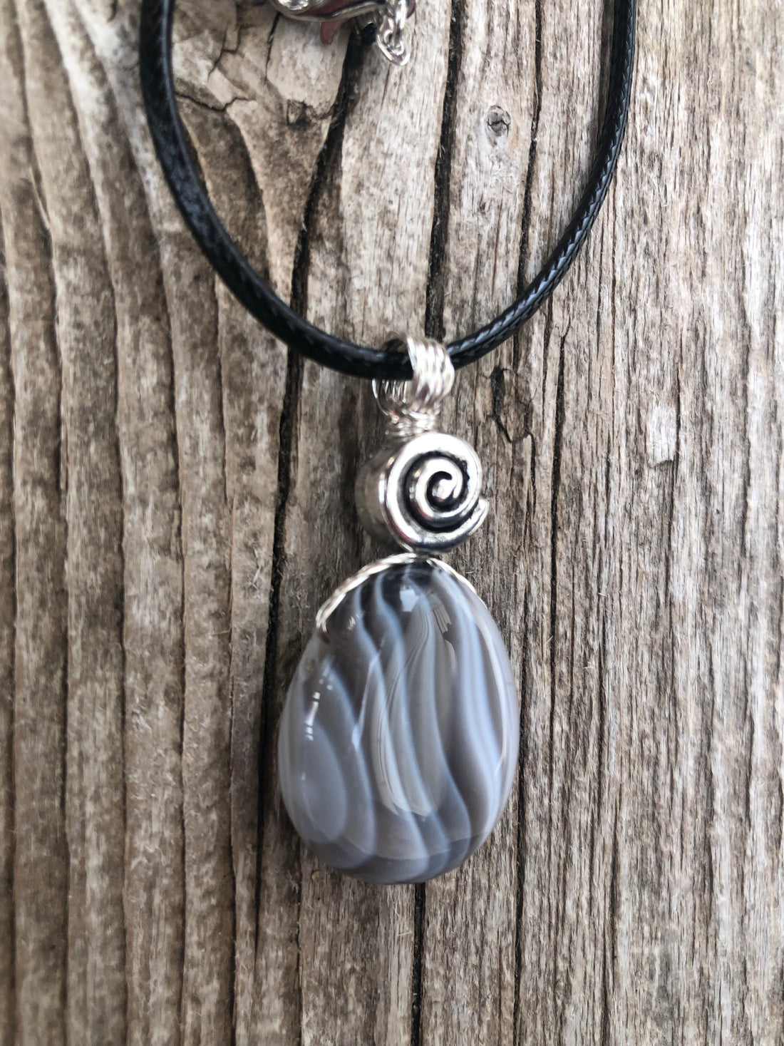 Botswana Agate for Energizing the Auric Field and Bringing Solutions. Swirl to Signify Consciousness.