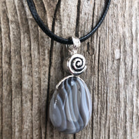 Botswana Agate for Energizing the Auric Field and Bringing Solutions. Swirl to Signify Consciousness.