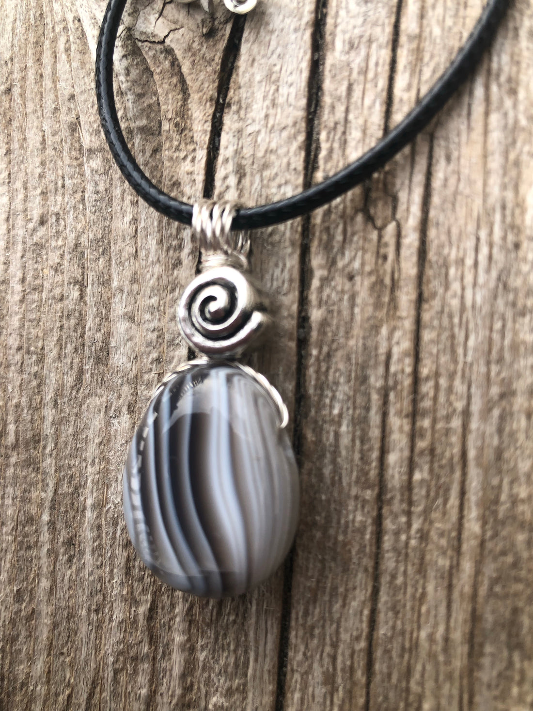 Botswana Agate for Energizing the Auric Field and Bringing Solutions. Swirl to Signify Consciousness.