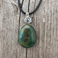 Ruby in Fuchsite for Positivity, Psychic Awareness and Abundance. Swirl to Signify Consciousness.