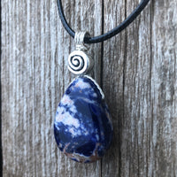 Sodalite for Creativity and Inspiration. Swirl to Signify Consciousness.
