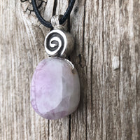 Kunzite for Protection, Intuition and Heart Awareness. Swirl to Signify Consciousness.