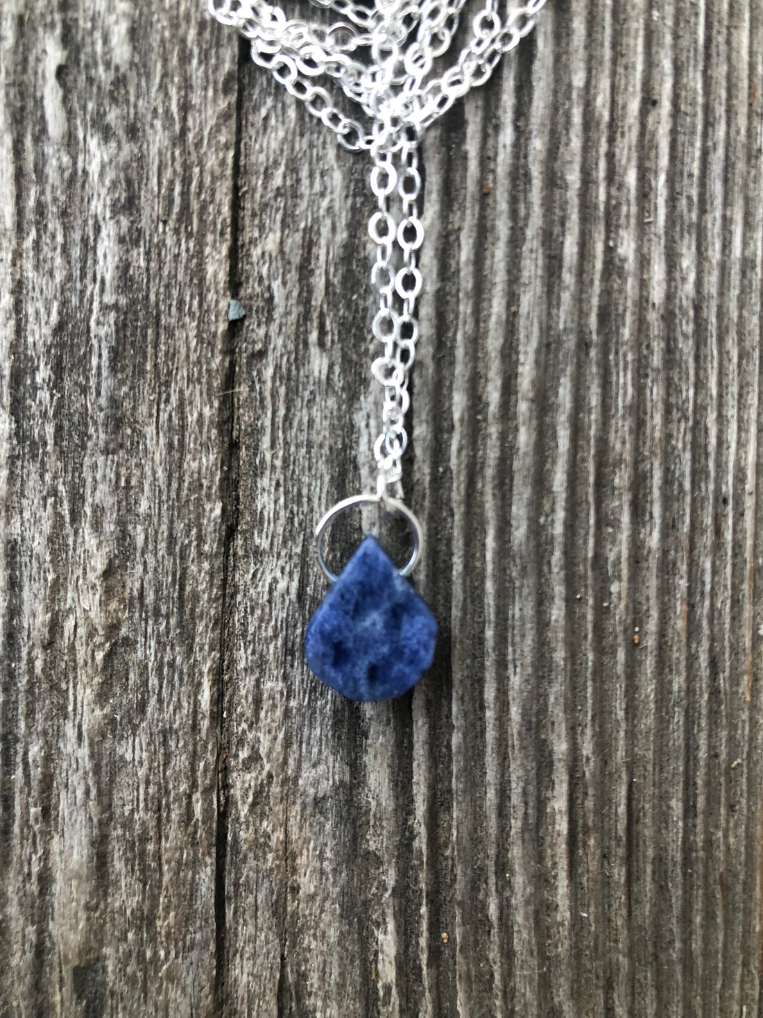 Sodalite for Creativity and Inspiration. Swirl to Signify Consciousness.