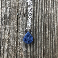 Sodalite for Creativity and Inspiration. Swirl to Signify Consciousness.