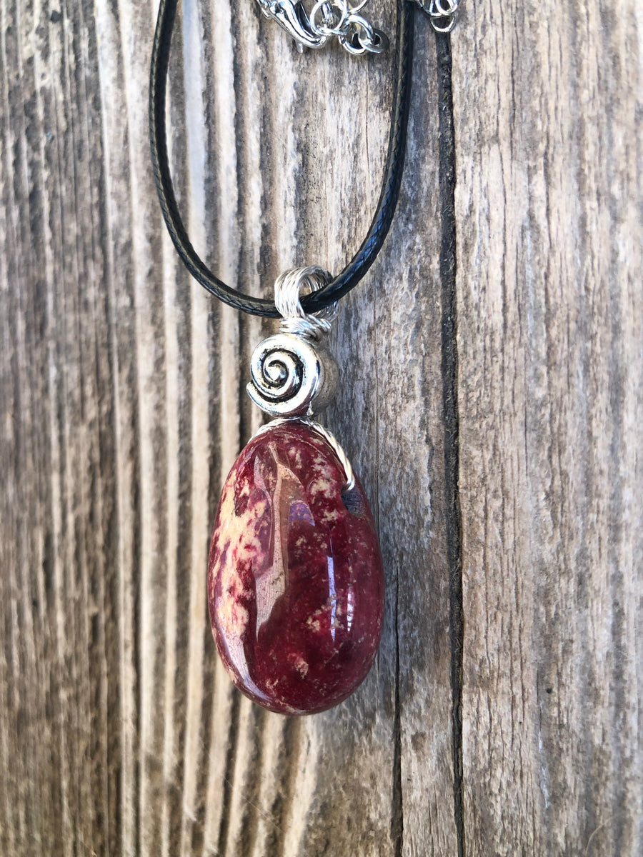 Thulite for Regeneration, Love and an Appreciation of Self. Swirl to Signify Consciousness.