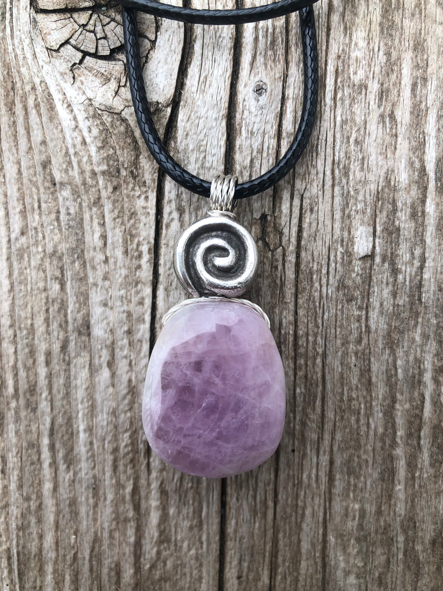 Kunzite for Protection, Intuition and Heart Awareness. Swirl to Signify Consciousness.
