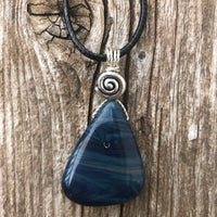 Sieber Agate for Strength, Confidence and Protection. Swirl to Signify Consciousness.
