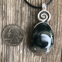 Ocean Jasper for Positivity, Forward Movement. Swirl to Signify Consciousness.