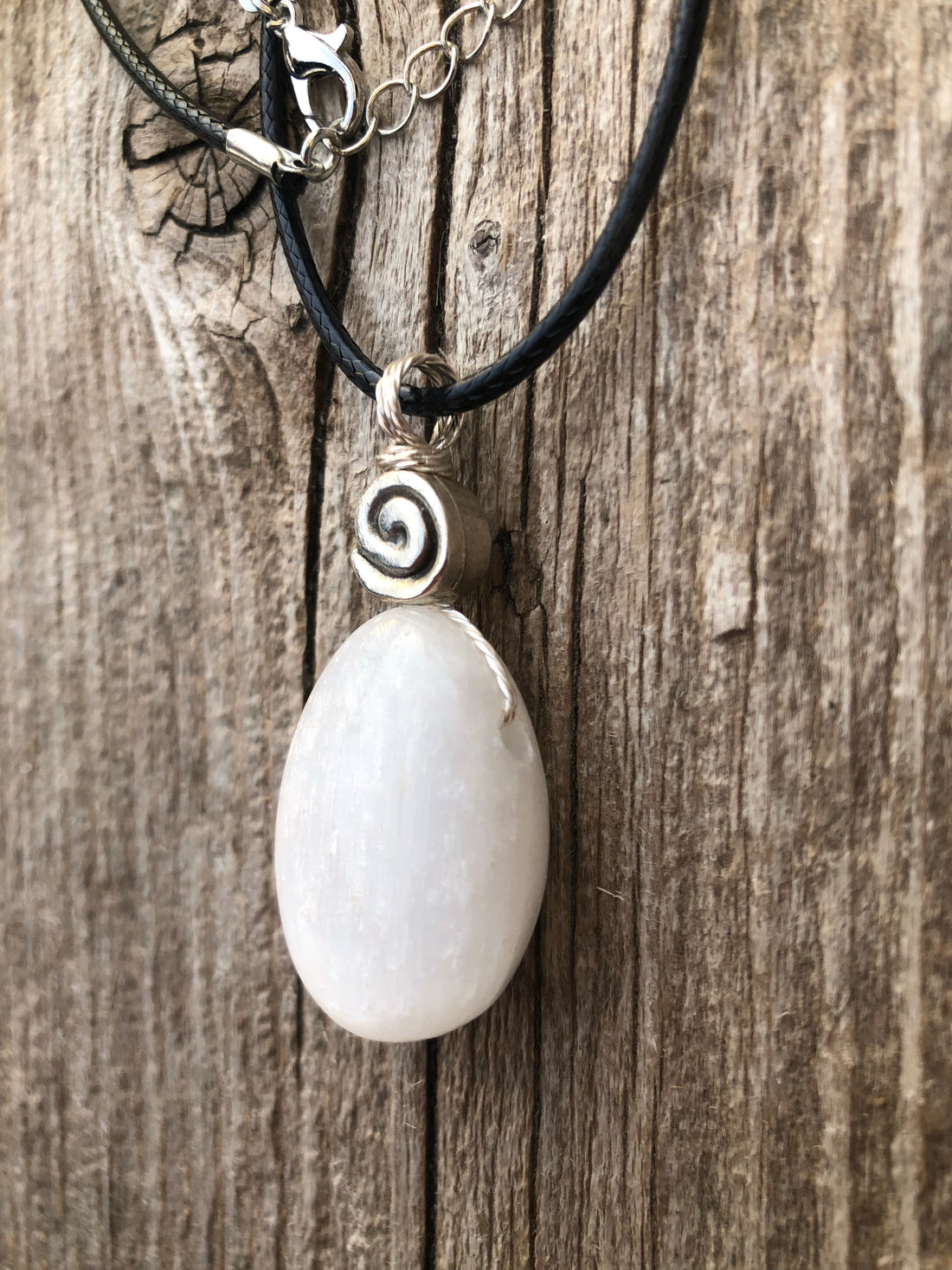 Selenite Necklace for Clearing Energy and Understanding. Swirl Signifies Consciousness