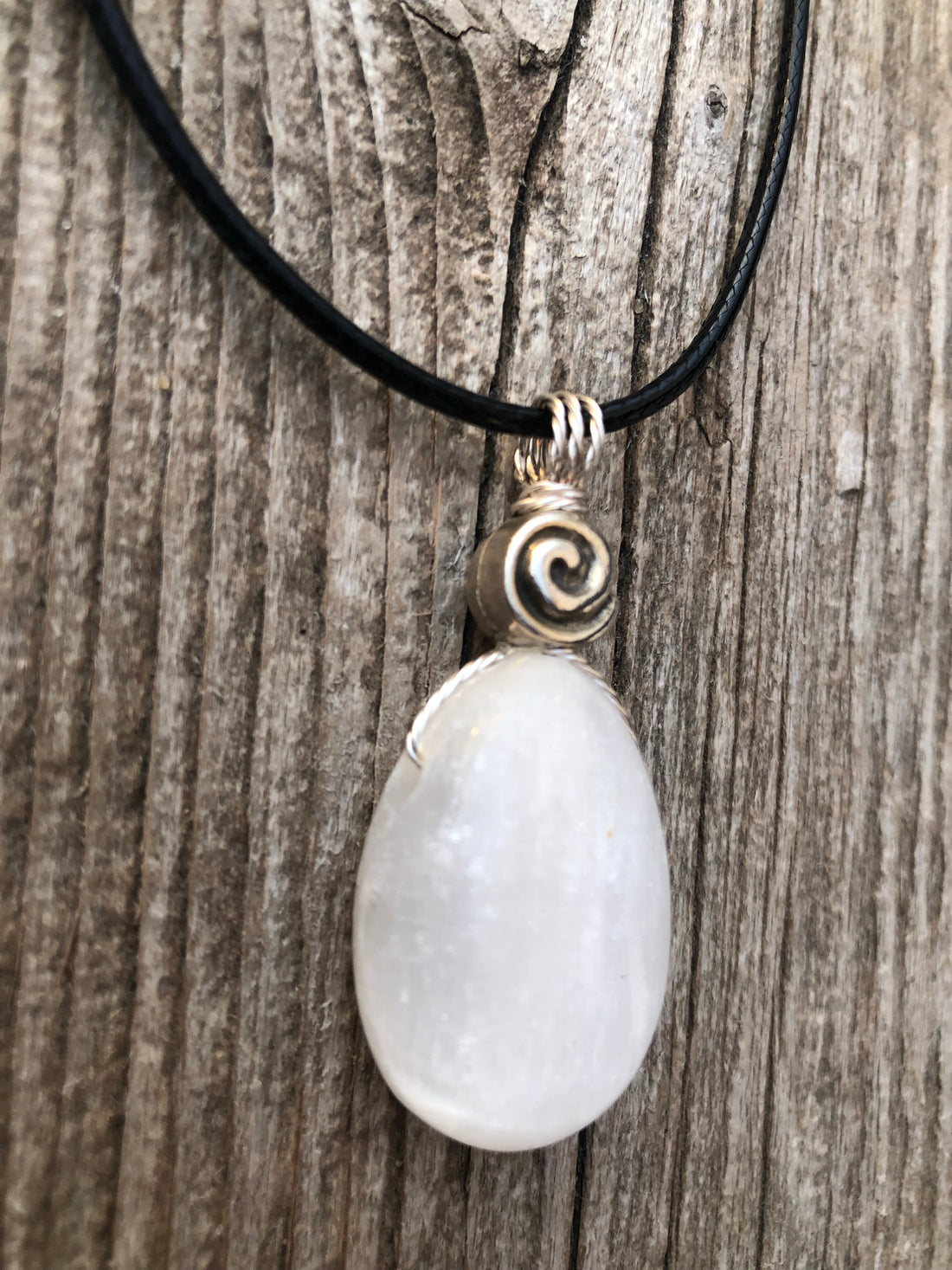 Selenite Necklace for Clearing Energy and Understanding. Swirl Signifies Consciousness