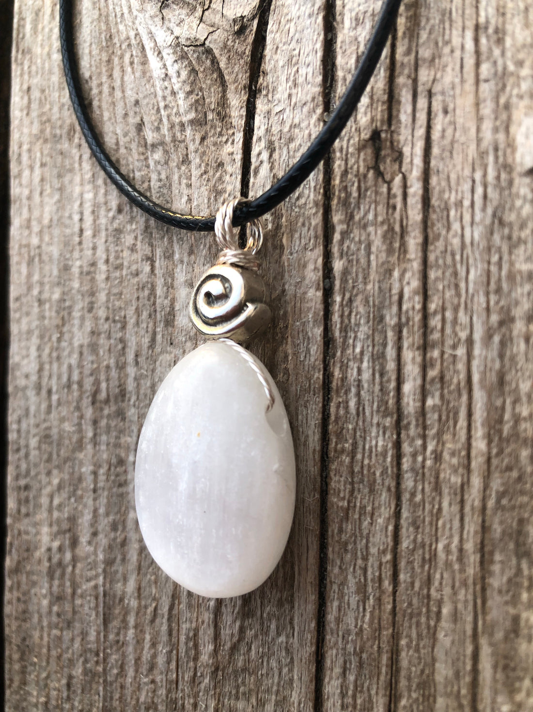 Selenite Necklace for Clearing Energy and Understanding. Swirl Signifies Consciousness