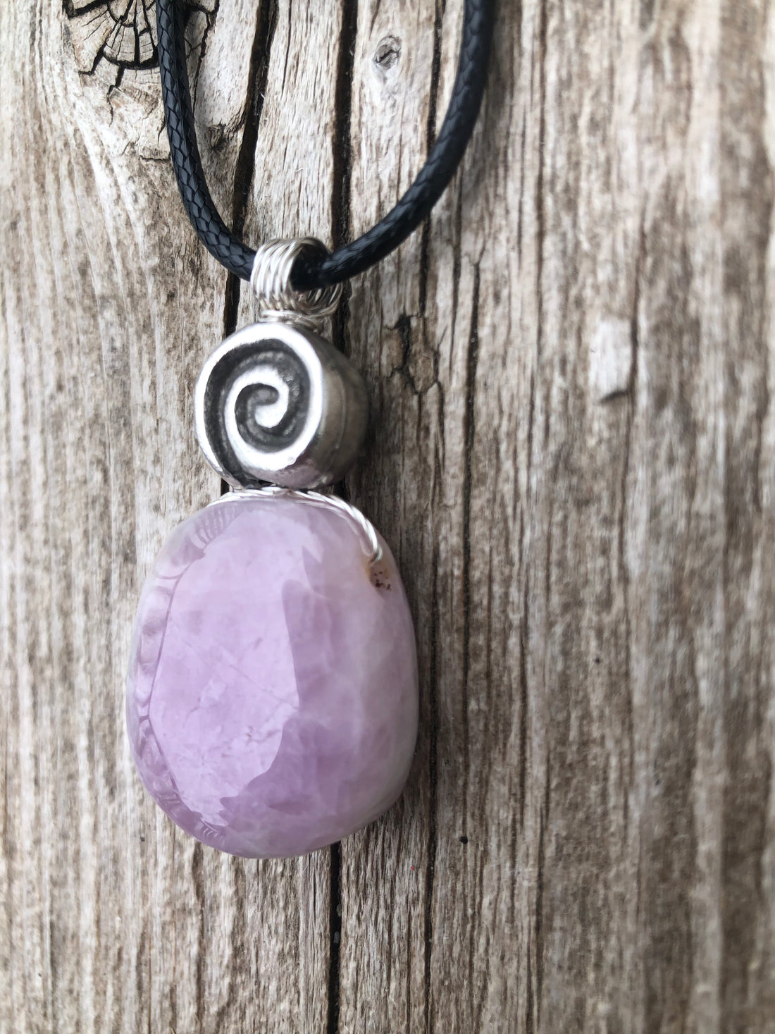 Kunzite for Protection, Intuition and Heart Awareness. Swirl to Signify Consciousness.