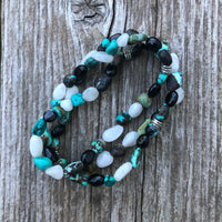 Turquoise, Moonstone and Tourmaline for Communication, Expression of Self and Soul and Reflection. Worn as a Bracelet or Necklace.