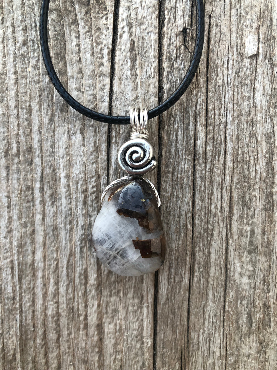 Siderite in Cryolite for Opening Chakras, Positivity, and Intuition. Swirl to Signify Consciousness. 18 inch Cable Included.