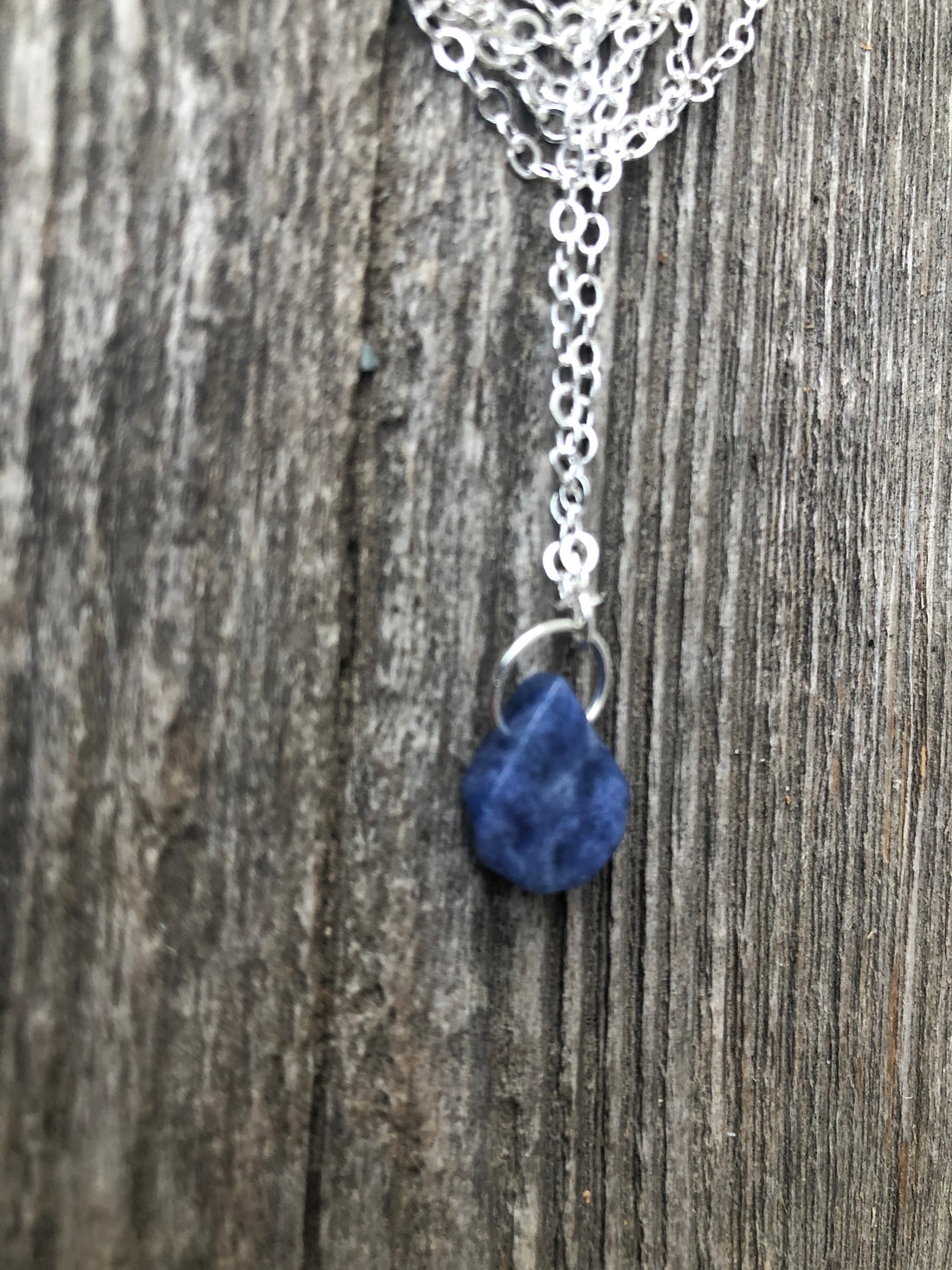 Sodalite for Creativity and Inspiration. Swirl to Signify Consciousness.