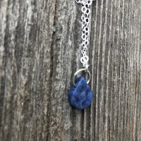 Sodalite for Creativity and Inspiration. Swirl to Signify Consciousness.